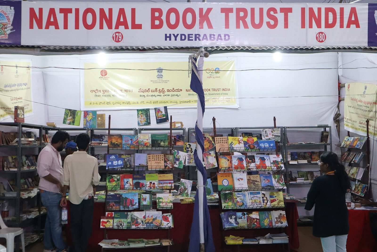 Readers of all ages at a book fair (demo photo)